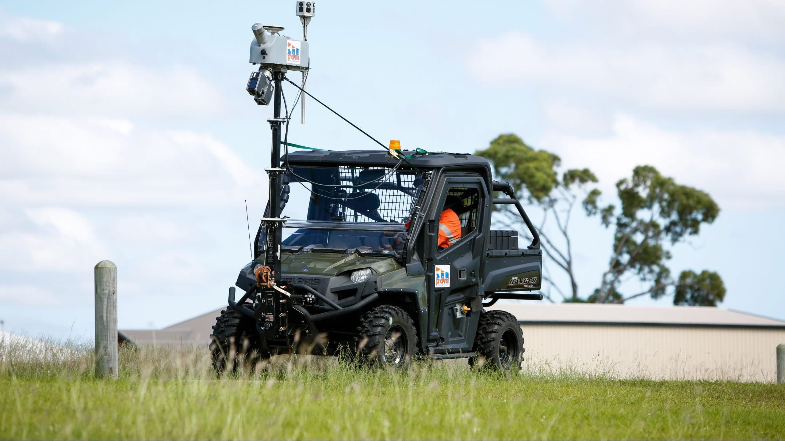 All-terrain vehicle carrying PDM’s mast-mounted LiDAR scanner and cameras