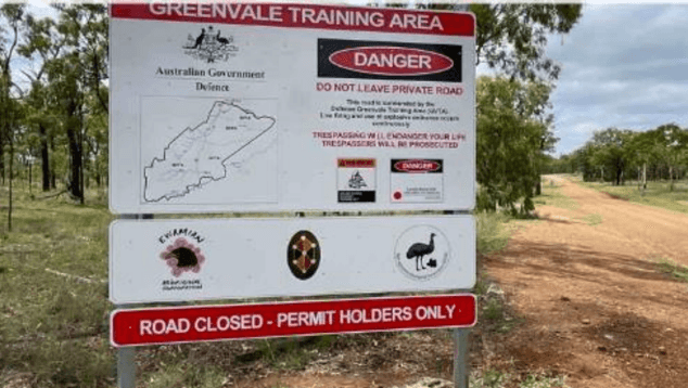 Defence sign for the Greenvale Training Area beside an unsealed road, marked “Road closed – permit holders only”